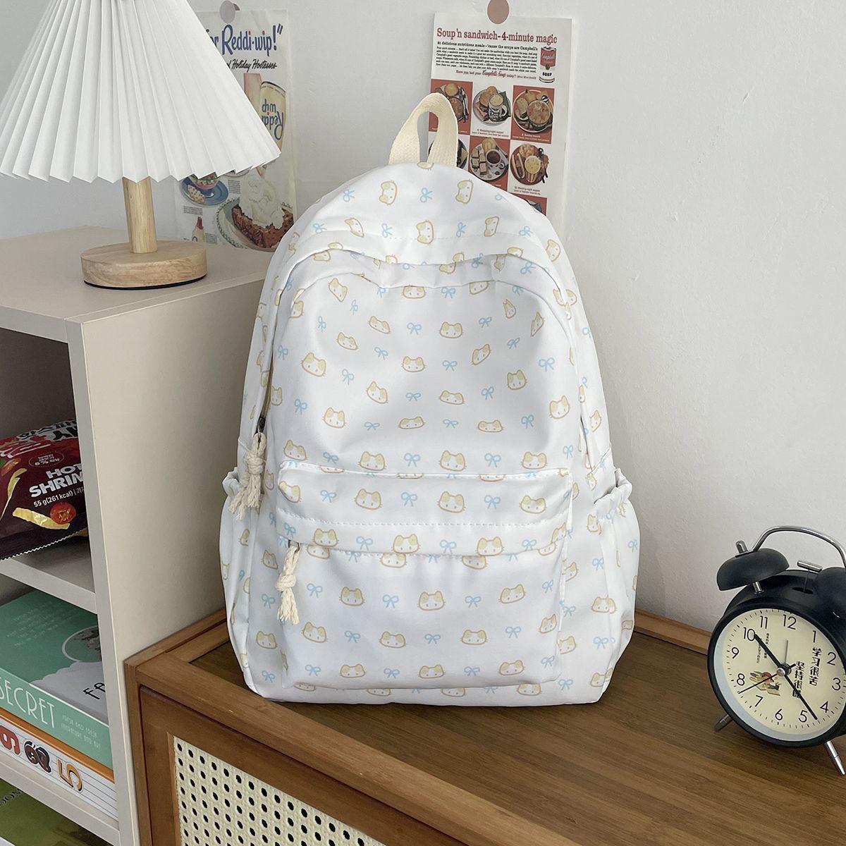 

Japanese cute backpack high value girl niche large capacity schoolbag ins junior high school student college backpack Kitten pattern double shoulder back