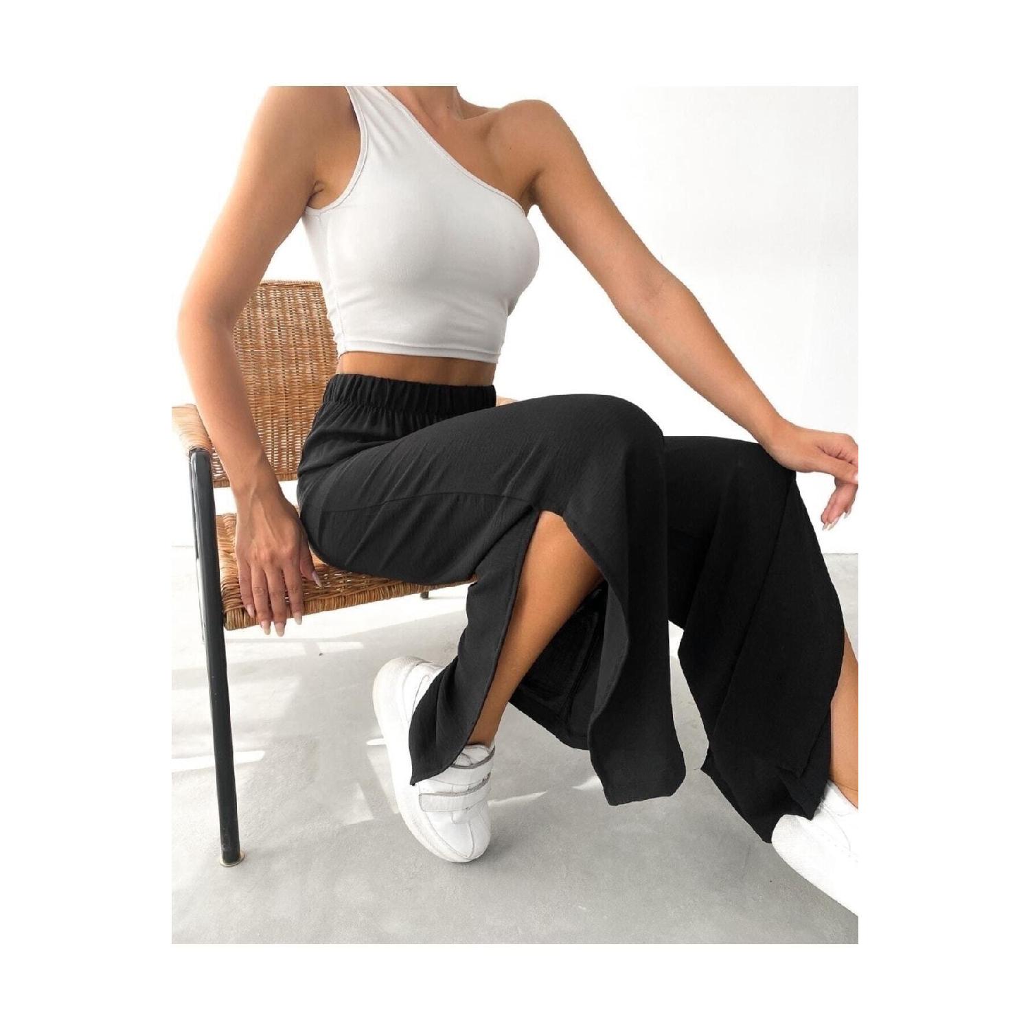 

Женские брюки Aerobin с эластичным поясом и боковыми разрезами, черные