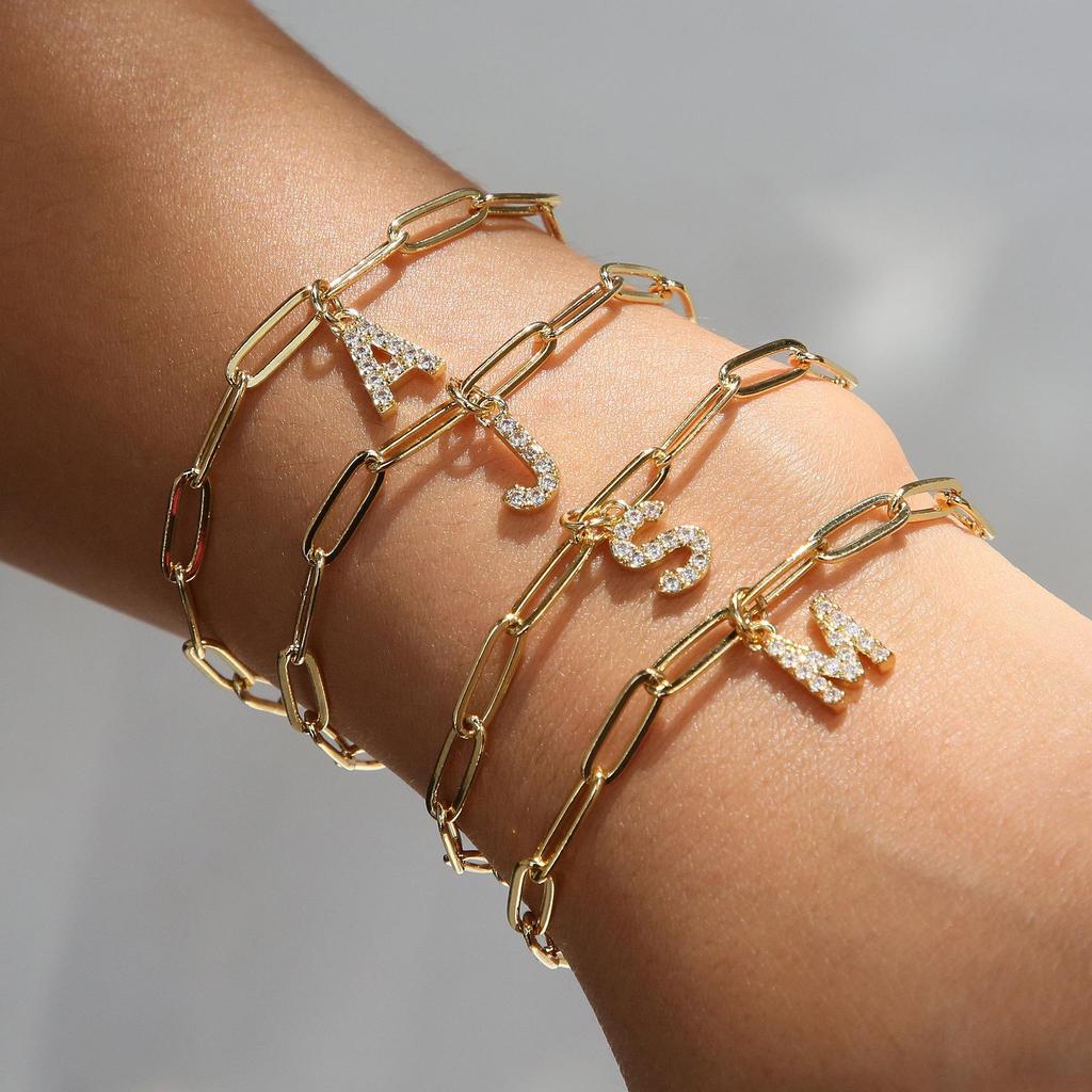 European & American Fashion 26-Letter Pendant Bracelet: Cubic Zirconia Micro-Paved Paperclip Chain, Elegant Women's Accessory.