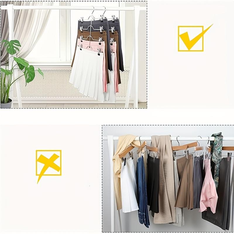 Four-layer dress hanger with 8 clips. Adjustable non-slip hanger. Made of stainless steel. Foldable for drying clothes.