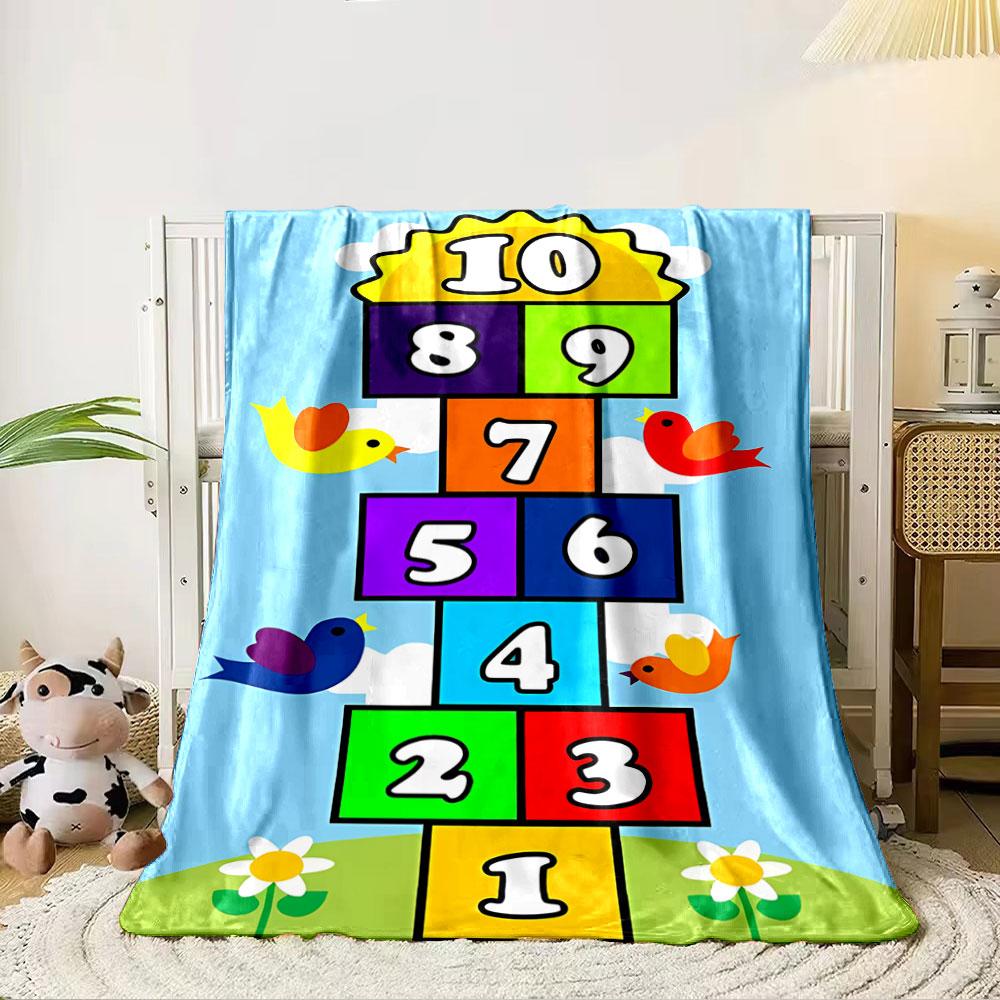 Brightly colored numbered blocks arranged in a hopscotch-like vertical layout. for all seasons blanket lunch break throw gift 80cm x 120cm