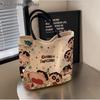 2025 Damen Cartoon Canvas Tragetasche - Schultertasche mit großer Kapazität für Pendler oder Schule