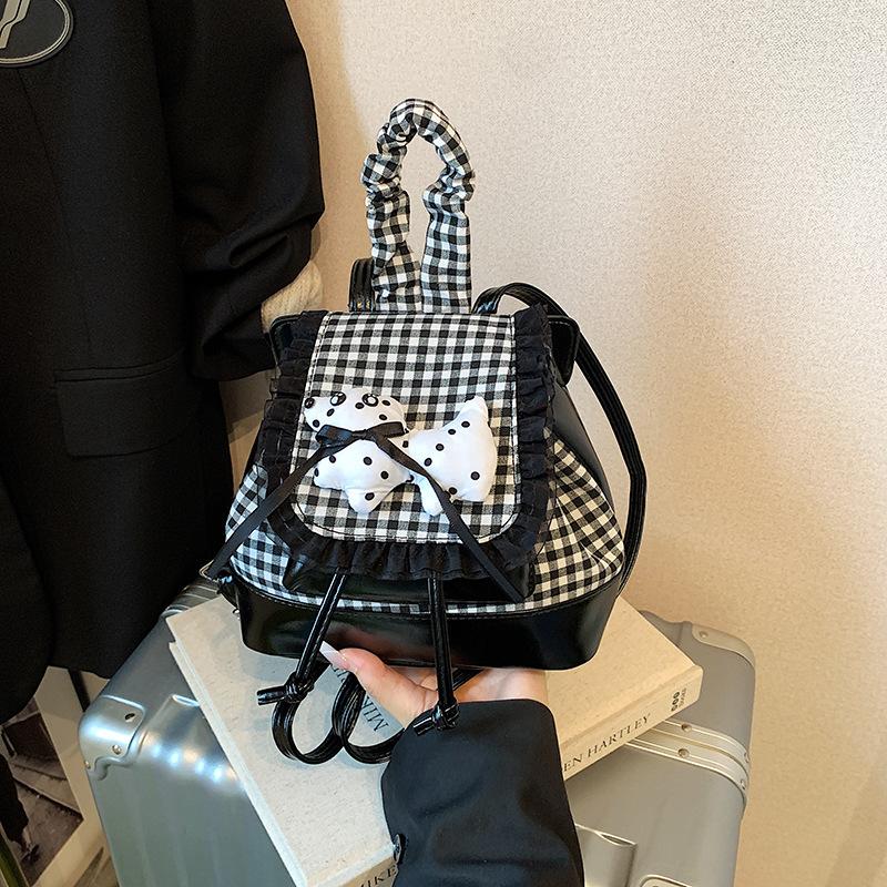 

Cartoon puppy cute backpack women s new high-end plaid backpack girl small bag чёрный