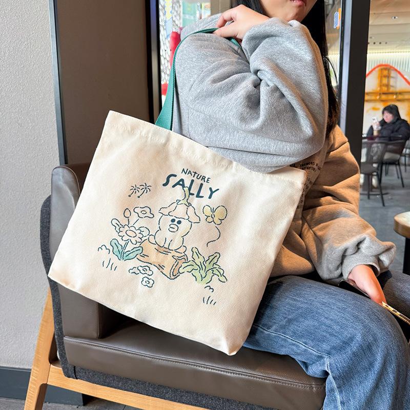Cute genuine brown bear canvas bag women's new large-capacity zipper student shoulder bag tutoring bag