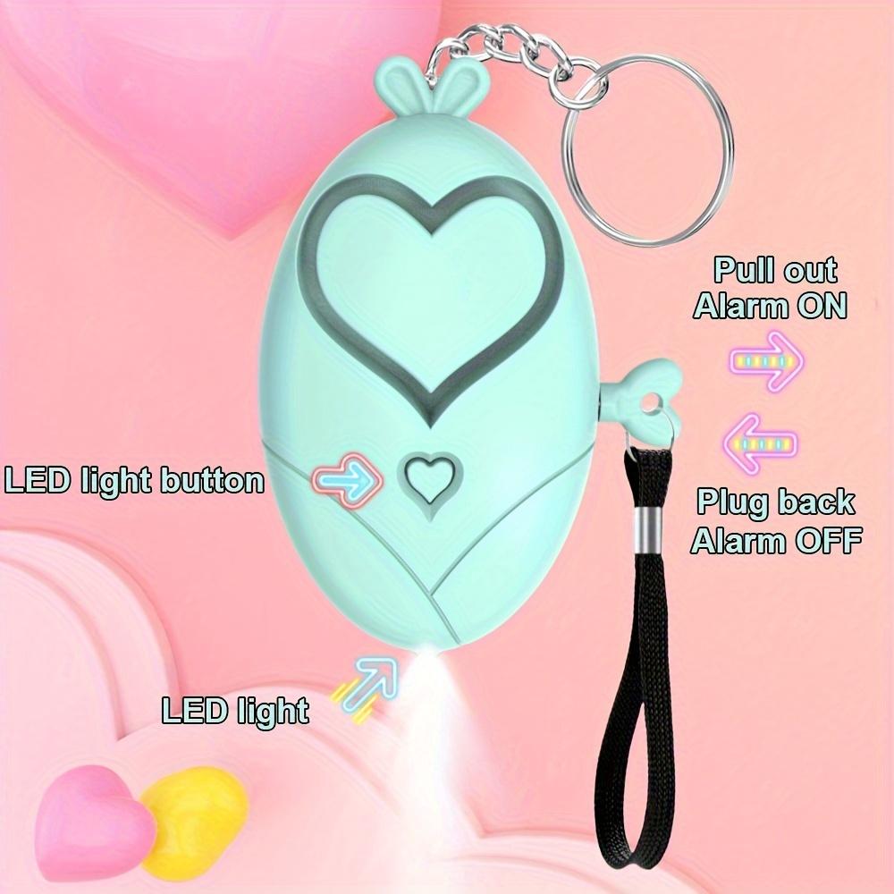 130DB Allarme Personale Portachiavi a Forma di Cuore con Luce LED Sirena di Sicurezza Portatile Allarme di Sicurezza di Emergenza per Ragazze Donne Anziani