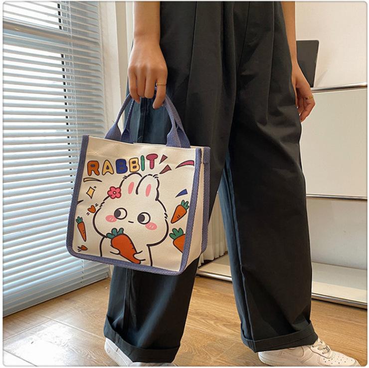 Japanese cute canvas bag bunny printed cartoon less tutoring bag go out hand carry bento bag wholesale