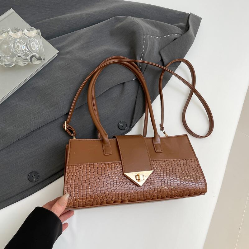 

This year s popular women s bags 2025 spring and summer new fashion crocodile pattern splicing handbag texture large capacity messenger коричневый