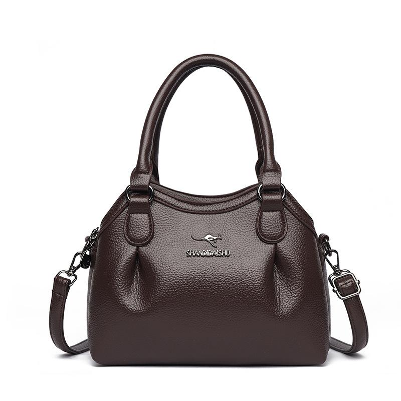 

Spring New Women s Bag Bucket Bag Large Capacity Soft Leather Commuting Shoulder Crossbody Bag Versatile, High-end and Fashionable коричневий