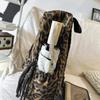 Leopard Print Backpack Casual Daily Use Trendy Street Style Lightweight Backpack for Women with Tassel Detail for School Travel and Everyday Outings
