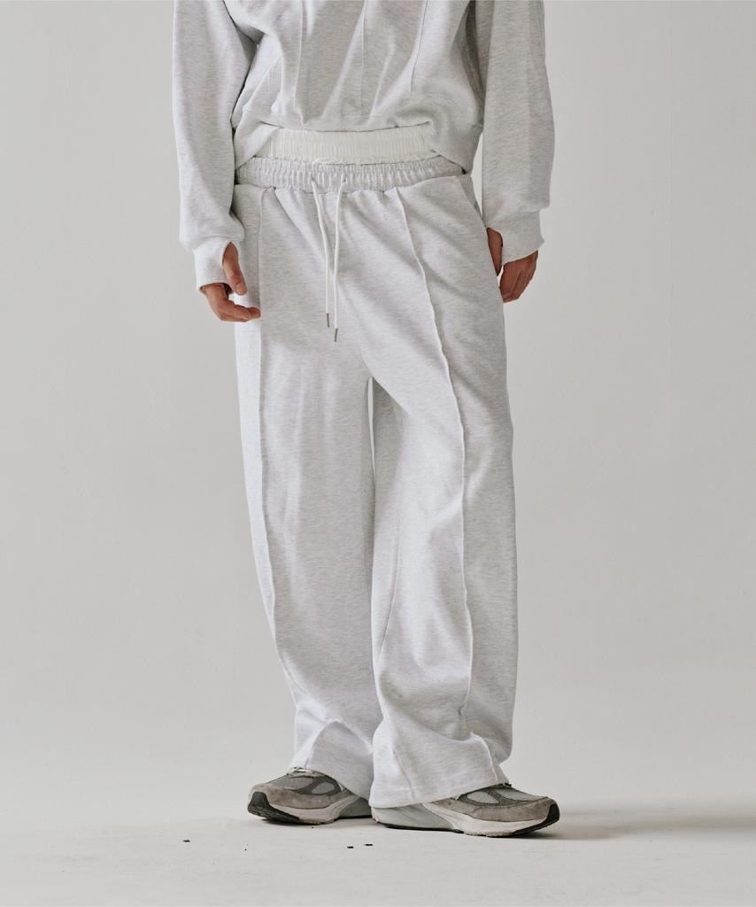 Deoseutoli Section Sagging Tracksuit Pants (White Melange)