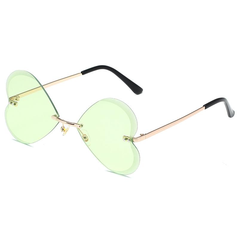 Butterfly frameless sunglasses, European and American retro trend love peach heart personalized metal sunglasses women