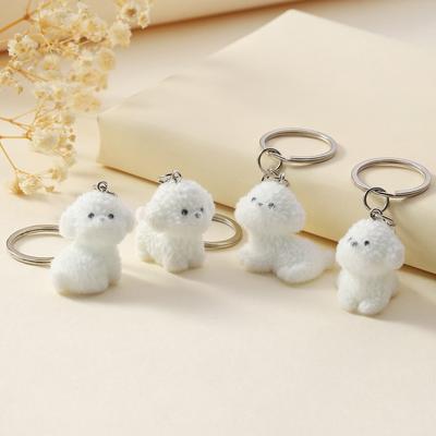 Portachiavi carino a forma di cucciolo floccato, cartone animato 3D, piccolo cane bianco, ciondolo, custodia per auricolari, zaino, borsa, decorazione, portachiavi per auto