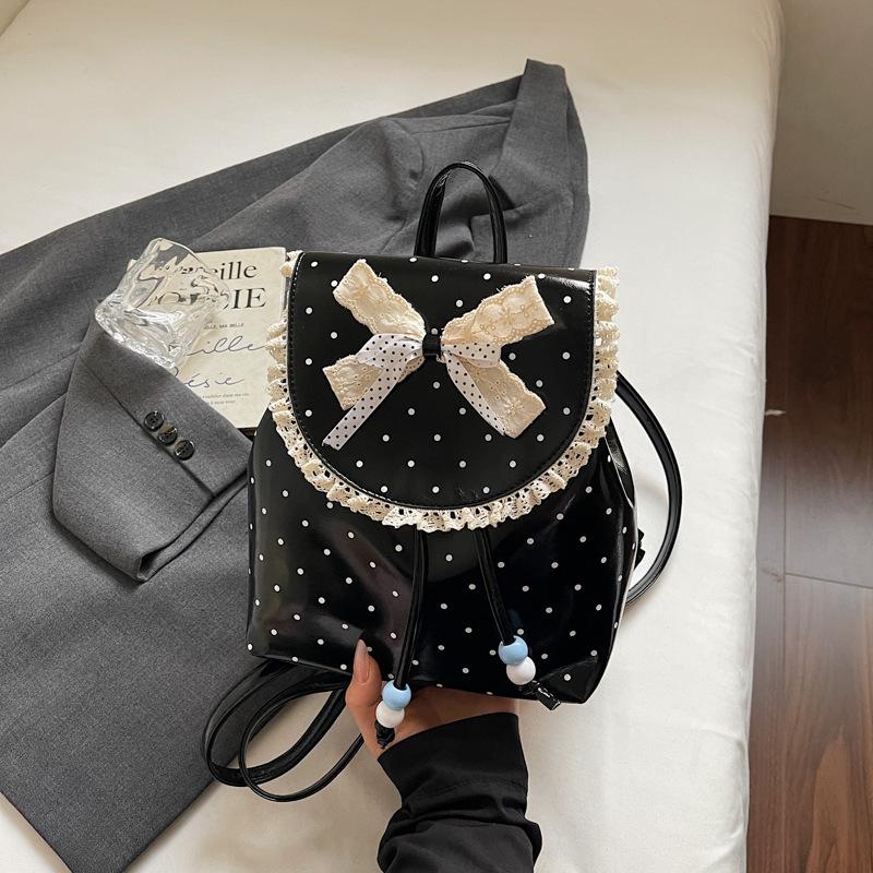 Schulrucksack1011 Frühling neu Spitze Damenrucksack süße Schwester Koreanisch gepunktet lässig retro ausländischer Stil kleiner Rucksack