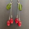 Gothic Skull Earrings in Fashionable Red Vampires Skull Style with Green Leaf Details for Fashion Forward Women