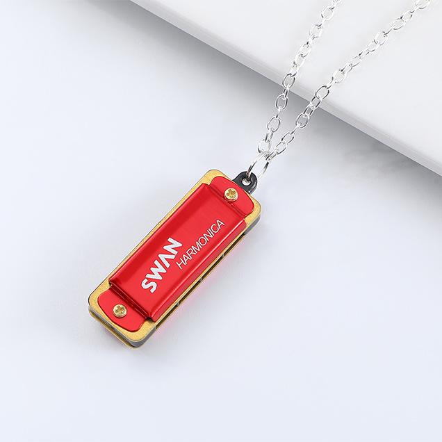 Collar de Armónica Swan Cross de 4 Agujeros: Mini Instrumento de Viento para Niños y Principiantes