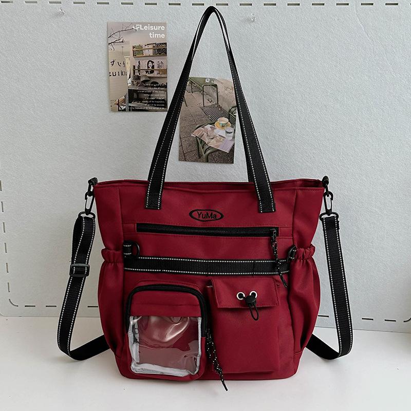

New schoolbag women s large-capacity simple junior high school student backpack brand college student casual shoulder bag