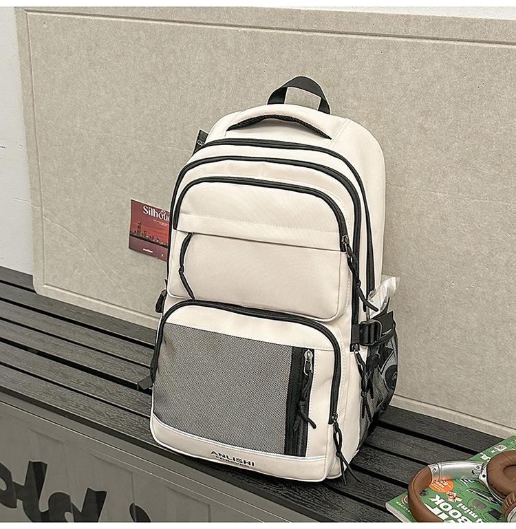 School bag 2025 new Korean version solid color couple backpack large capacity multi-compartment school bag casual simple versatile backpack