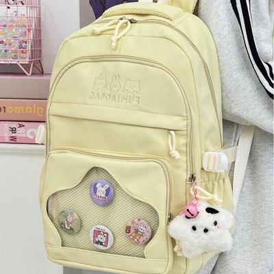 Der neue Schulranzen ist hochwertig, frisch und süß, ein bonbonfarbener Rucksack, ein leichter und großvolumiger Rucksack für Schüler der Unterstufe.
