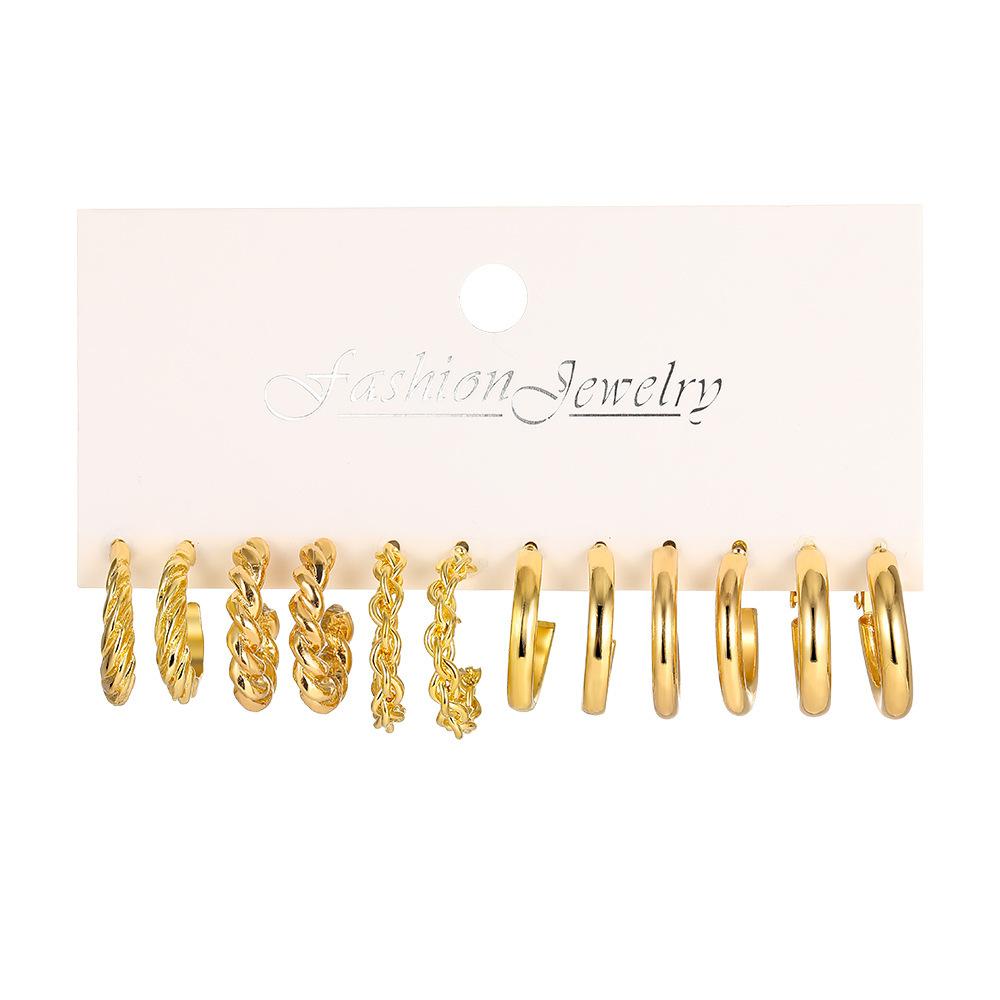 

Hot-selling creative individuality simple earrings ins European and American style C-shaped geometric twist gold alloy earrings 1 pair