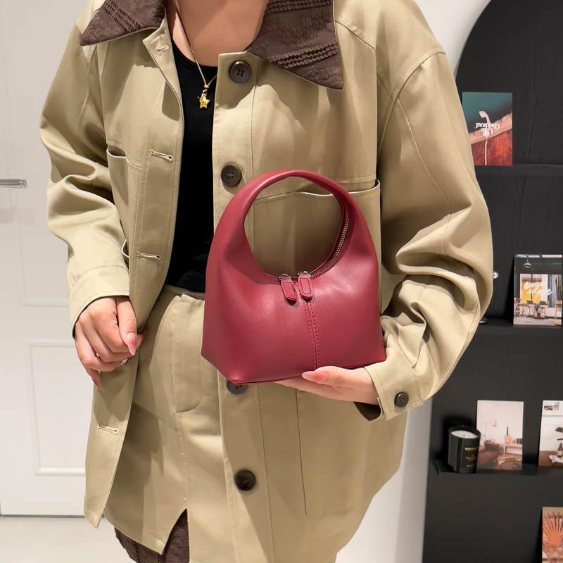A Trendy, Versatile and Stylish Hand-held Bag That Is Both Fashionable and Simple