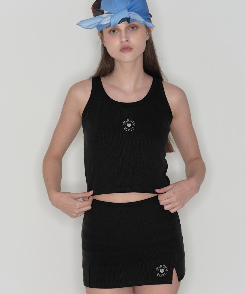 Tteolseutikeulleob Round Logo Slit Skirt Pants - Black