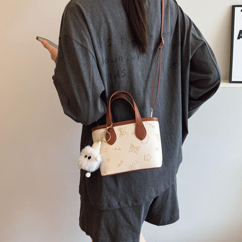 This Year, the Popular Contrasting Color Small Bag Women's 2025 New Versatile Messenger Bag Super Fire Embossed Portable Bucket Bag Wholesale