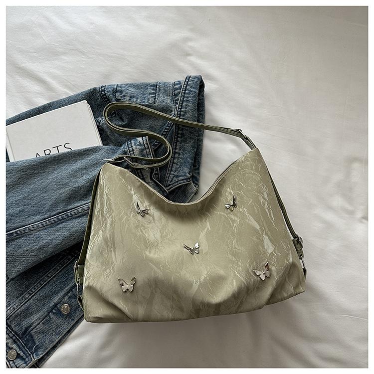 

Мягкая кожа бабочка большая вместимость высокая ценность нежная наплечная сумка 2025 лето новая женская наплечная сумка-мессенджер тоут single package зелёный