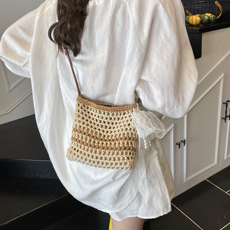

Summer niche messenger bag women s 2025 new fashion and leisure versatile seaside vacation woven bag