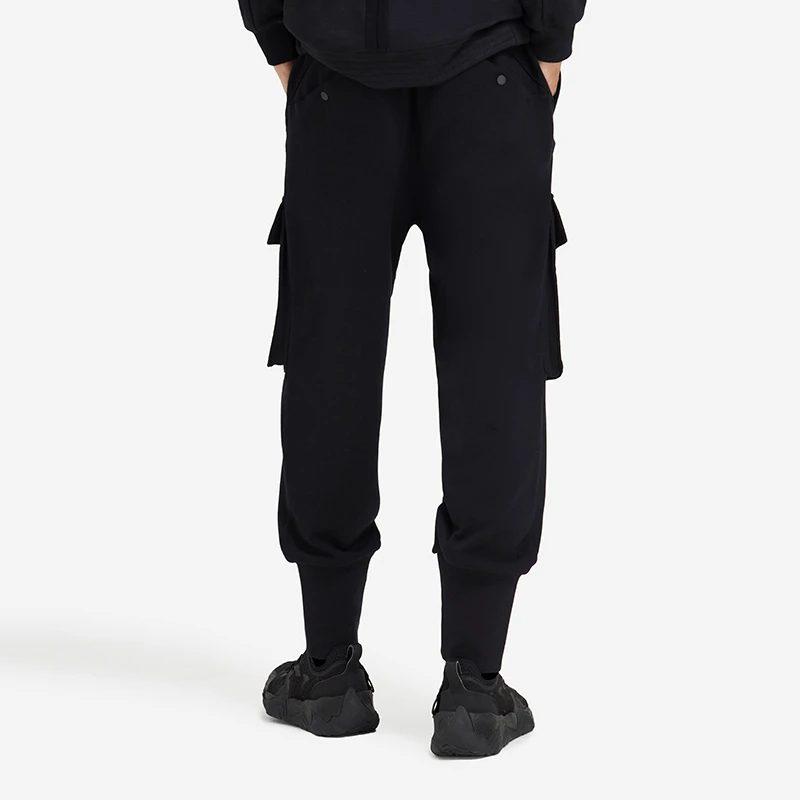 Li Ning Li Ning X Jackie Chan Stickade Sweatpants Herr Ecru AKLSC21-2