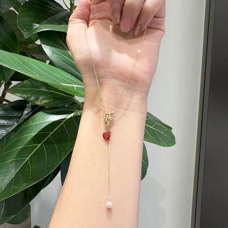 Xiaohongshu Red Heart Pearl Tassel Necklace: Simple, Fashionable, and Exquisite Clavicle Chain