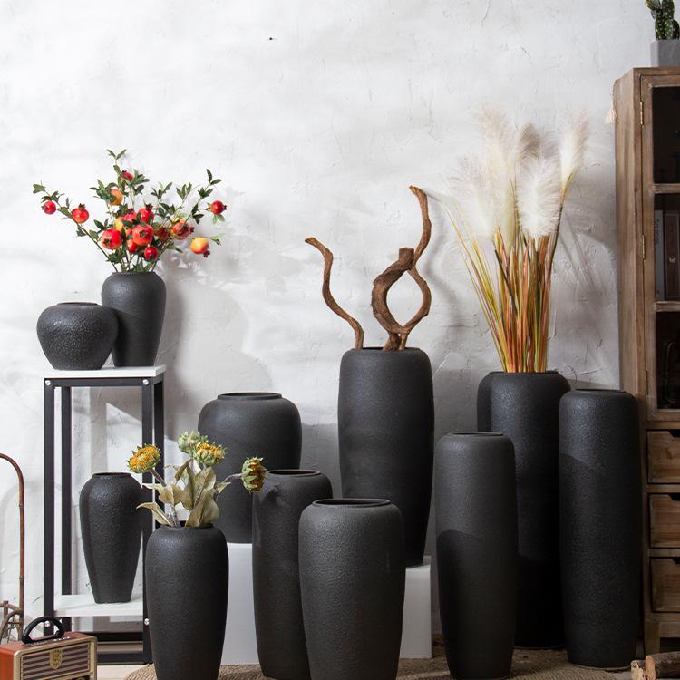 Jingdezhen Black Coarse Pottery Floor Vase: Modern Minimalist Japanese Decor for Hotel, Homestay, or Living Room.