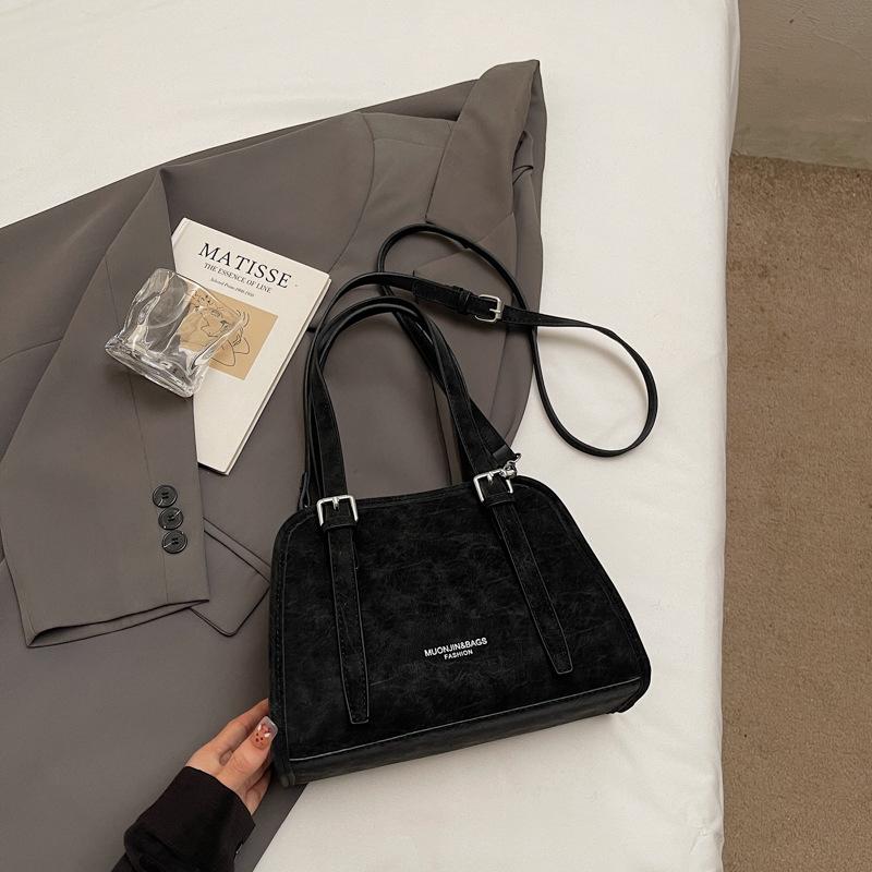 Korean version of high-value niche shoulder bag 2025 autumn new solid color fashion trend glossy underarm handbag women