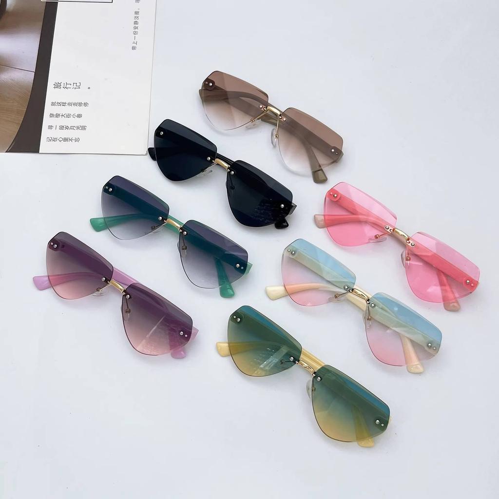 2026 New Children's Fashion Frameless Irregular Personality Trend Dopamine Color Ocean Lens Sunglasses