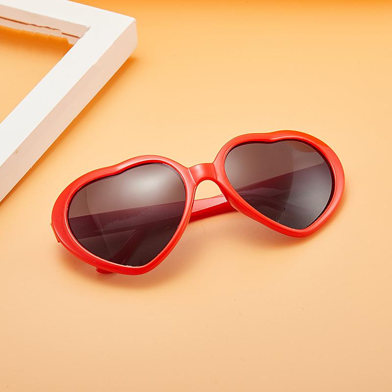 Peach heart Sunglasses love Sunglasses European and American trend frameless conjoined Sunglasses dazzling color glasses