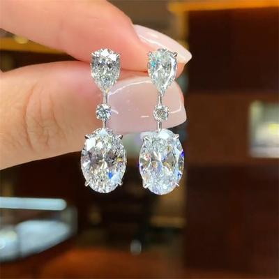 Boucles d'oreilles pendantes délicates Huitan avec cristal CZ géométrique couleur argent pour un port quotidien, accessoires de tempérament pour femmes, bijoux de mode