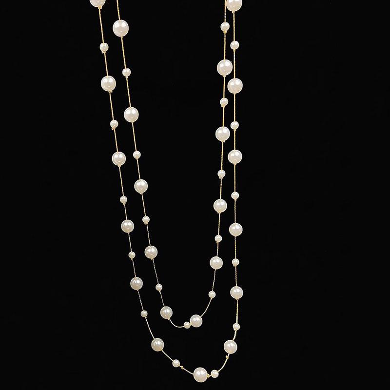 Korean Fashion Pearl Necklace: Elegant Long Chain for Women, Ideal for Sweaters, Versatile for Autumn and Winter.