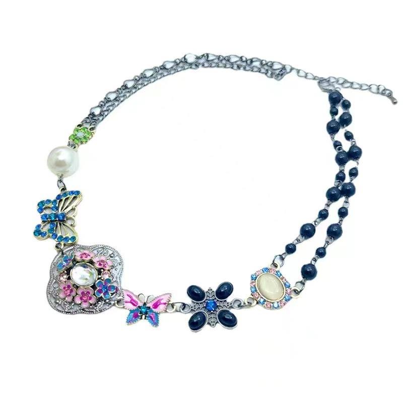 

European and American retro colored rhinestone butterfly hollow flower pearl women s short necklace retro style old couple necklace