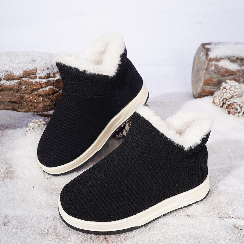 Non-slip thick-soled winter warm cotton slippers are all-inclusive, and men's and women's indoor soft-soled piled and thickened fluffy cotton shoes.