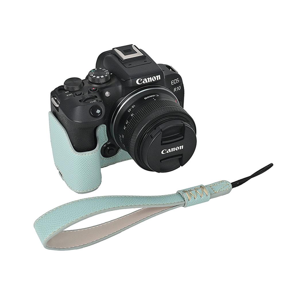 R10 Etui Pół-Kamerowe ze Skóry PU z Wzorem Dłoni dla Canon EOS R10 Z Otworem na Baterię Dolna Pokrywa z Paskiem na Rękę