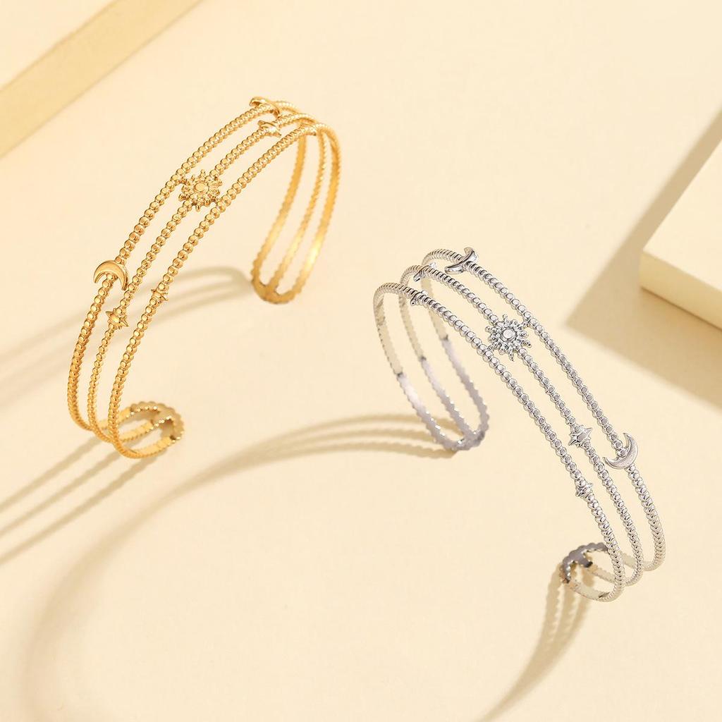 Retro Hollow Star Moon Stainless Steel Bracelet, Adjustable & Vacuum-Plated 18K Gold Jewelry.