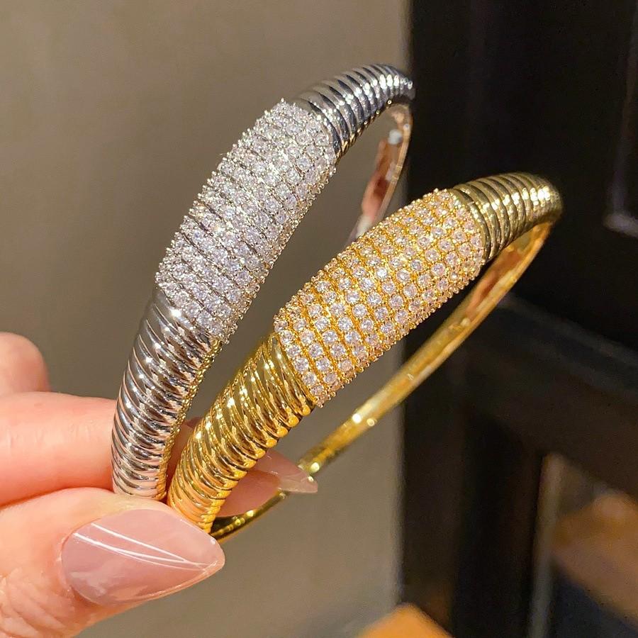 Elegant Striped Oval Bangle Bracelet With Gold Plating For Fashionable Women