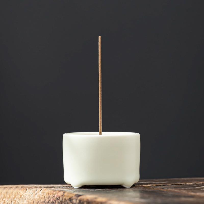 

Creative Pink Ceramic Incense Holder: Small Japanese Aromatherapy Burner for Home and Indoor Decor.