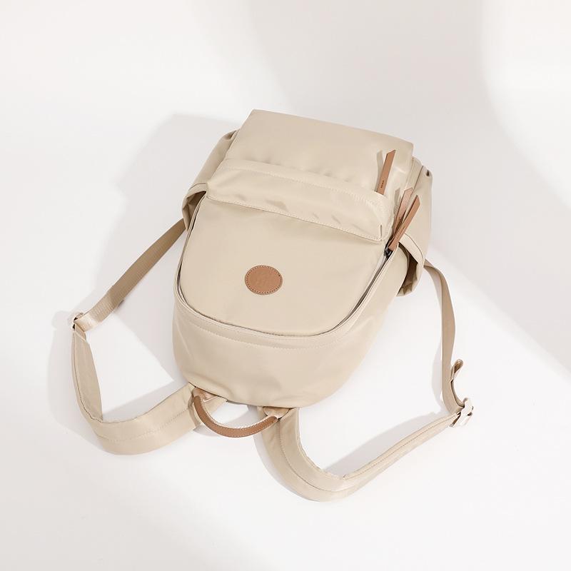 Large Capacity Oxford Cloth Backpack for Women Lightweight and Versatile New Commuting Backpack Korean Version Solid Color Travel Backpack