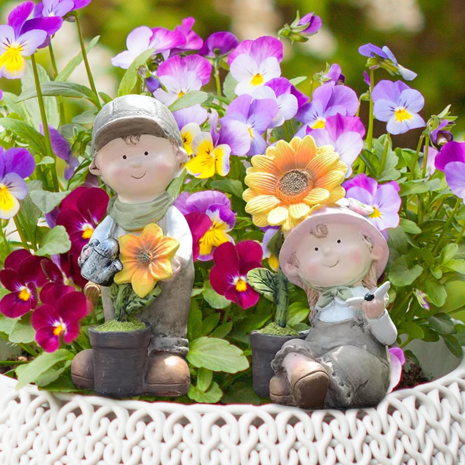 

Садовая статуя «Мальчик и девочка» розовый