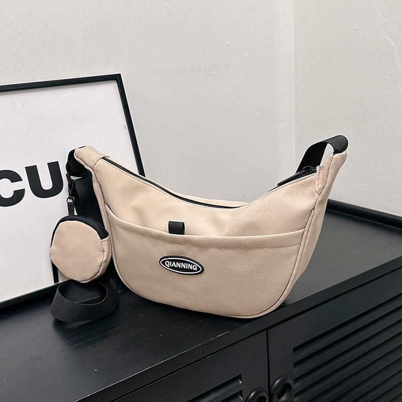 Trend versatile dumplings diagonal span bag niche sports leisure couple bag men's and women's shoulder bag personalized messenger bag