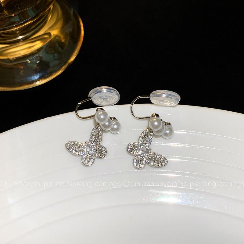 New French retro hollow bow zircon pearl earrings earclip women s light luxury high-end stud earrings women s