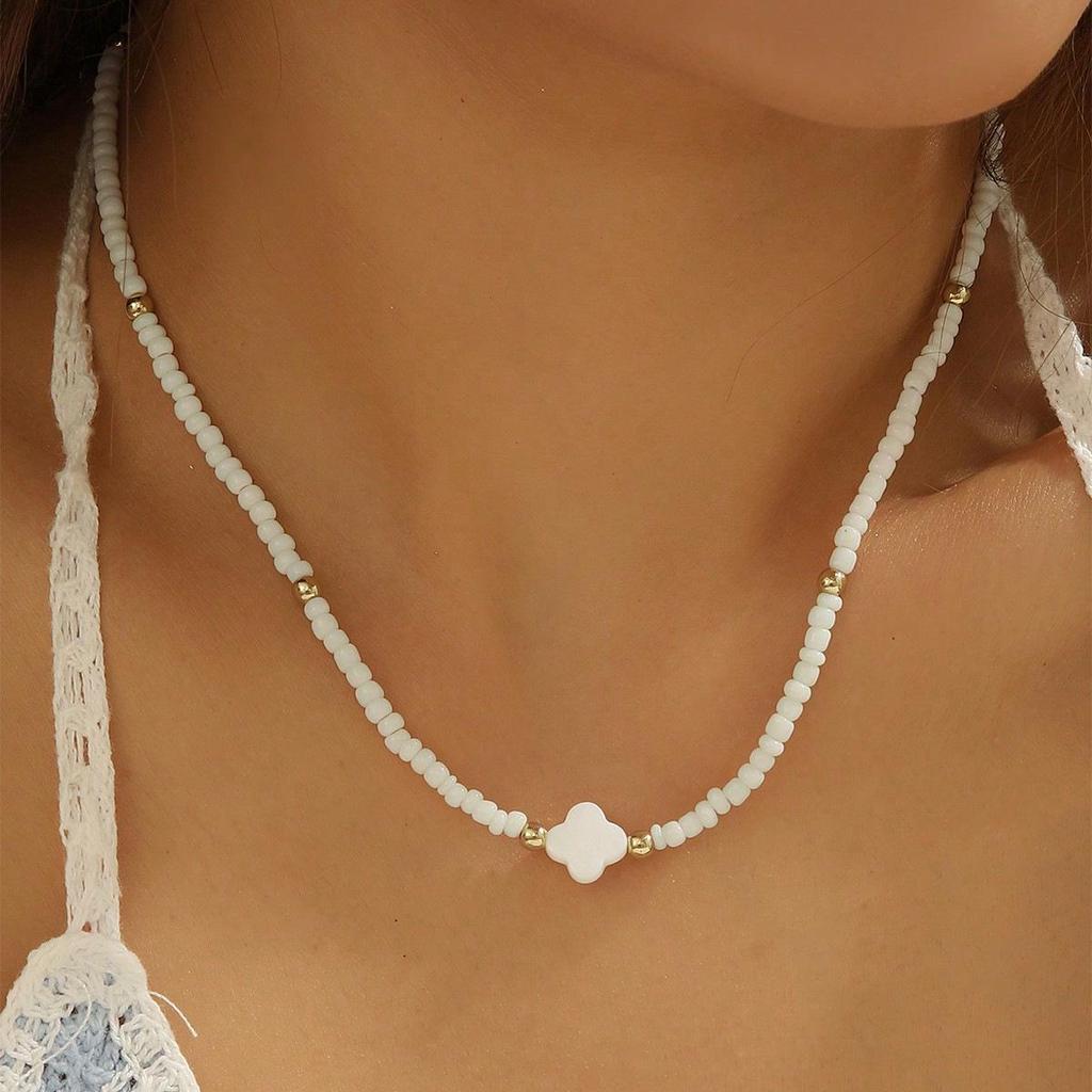 Bohemian Four-Leaf Clover Pendant Necklace: Mother-of-Pearl Beaded Choker with Seed Beads