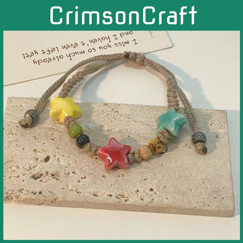 Farbiges einzigartiges pastellfarbenes Keramik-Perlenarmband mit Sternmotiven für Damen