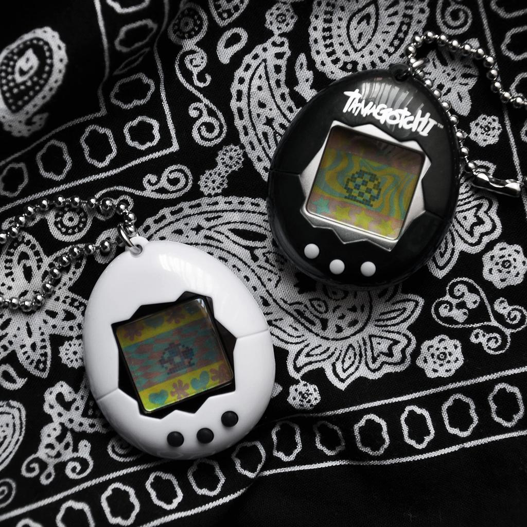 Tamagotchi Electronic Game, White/black