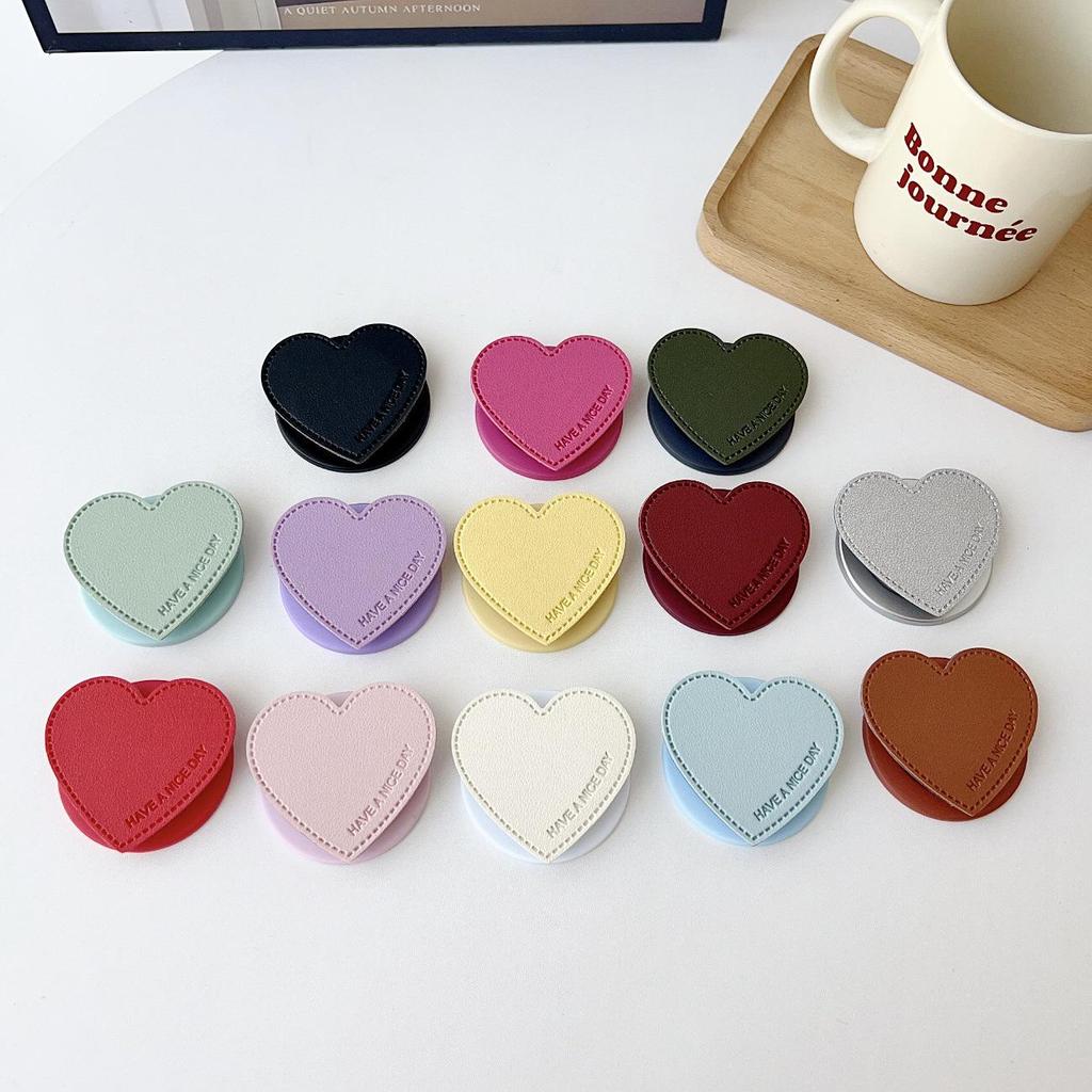 Leather Heart-Shaped Magsafe-Compatible Magnetic Phone Holder - Retractable, Foldable, Strong Adsorption
